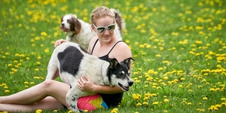 Roo with Lilly among the dandelions