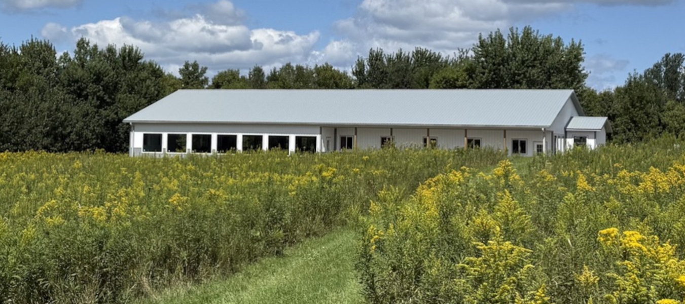The new building at Home For Life, with blooming goldenrod.  